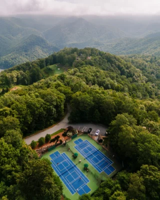 Serve and rally at new heights where the courts rise into the clouds.

Explore our premier resort amenities and book your trip at the link in bio. 

#MountainResort #PickleballCourts 
BLR Realty, LLC